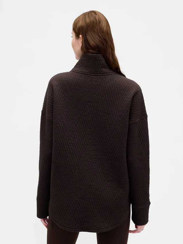 Suéter GapFit de jacquard acolchado con media cremallera