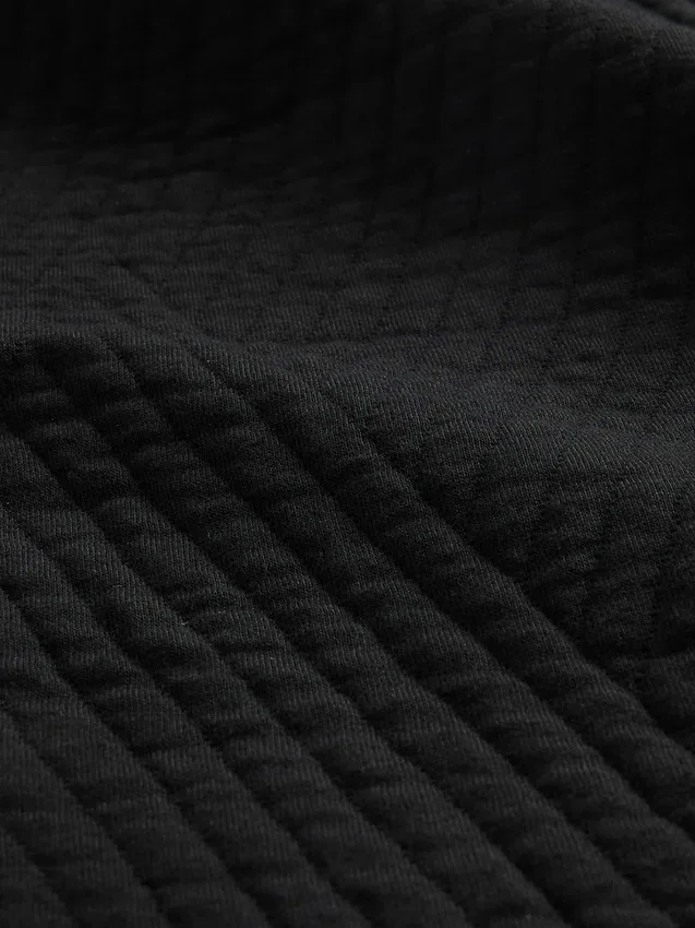 Suéter GapFit de jacquard acolchado con media cremallera