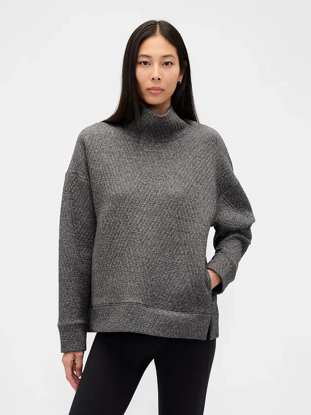 Suéter GapFit de punto jacquard acolchado con cuello de embudo