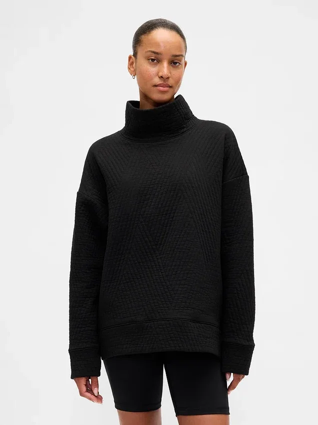 Suéter GapFit de punto jacquard acolchado con cuello de embudo