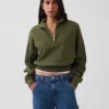 Suéter oversize de algodón texturizado con media cremallera