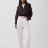 Suéter oversize de algodón texturizado con media cremallera