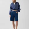 Suéter oversize de algodón texturizado con media cremallera
