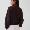 Suéter oversize de algodón texturizado con media cremallera