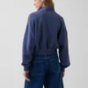 Suéter oversize de algodón texturizado con media cremallera