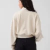 Suéter oversize de algodón texturizado con media cremallera