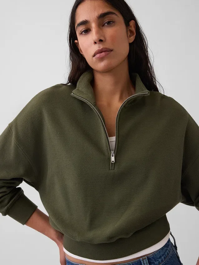 Suéter oversize de algodón texturizado con media cremallera