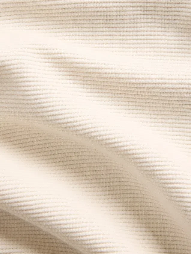 Suéter oversize de algodón texturizado con media cremallera