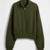 Suéter oversize de algodón texturizado con media cremallera