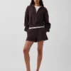 Suéter oversize de algodón texturizado con media cremallera