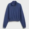 Suéter oversize de algodón texturizado con media cremallera