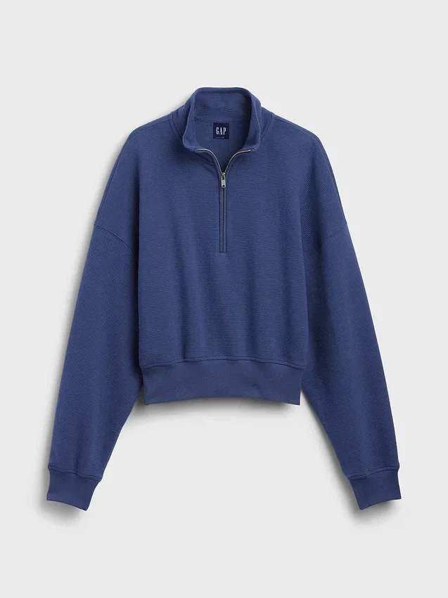 Suéter oversize de algodón texturizado con media cremallera