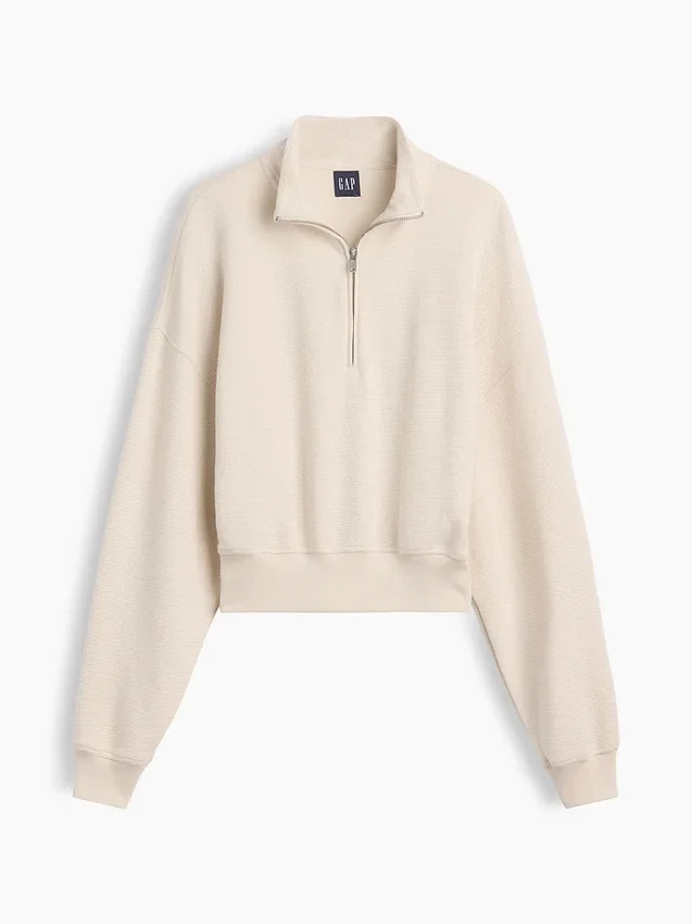 Suéter oversize de algodón texturizado con media cremallera