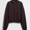 Suéter oversize de algodón texturizado con media cremallera