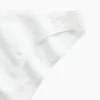 Tanga cheeky de algodón orgánico elástico súper suave
