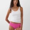 Tanga de algodón orgánico elástico con ribete de encaje