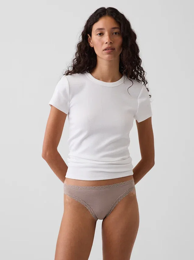 Tanga de algodón orgánico elástico con ribete de encaje