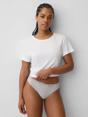 Tanga de algodón orgánico elástico con ribete de encaje
