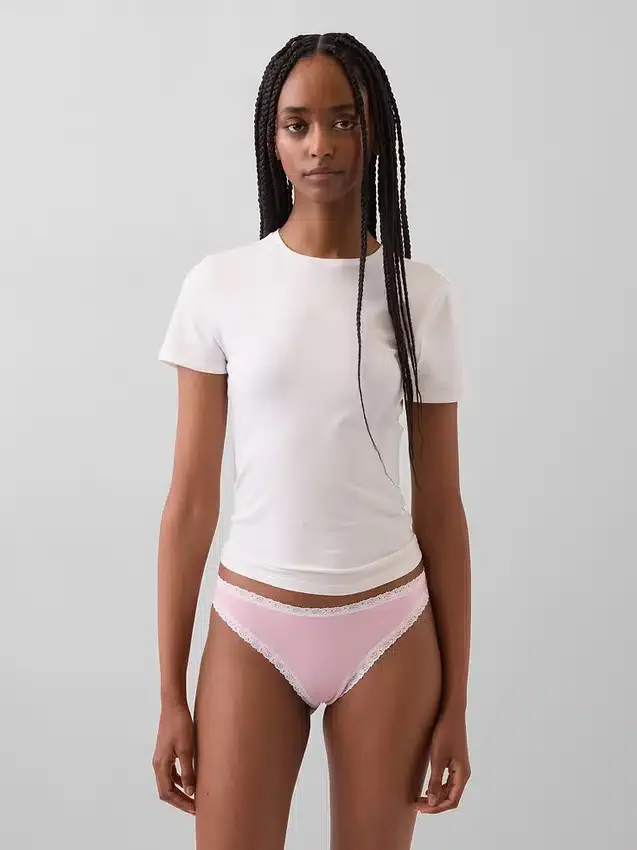 Tanga de algodón orgánico elástico con ribete de encaje