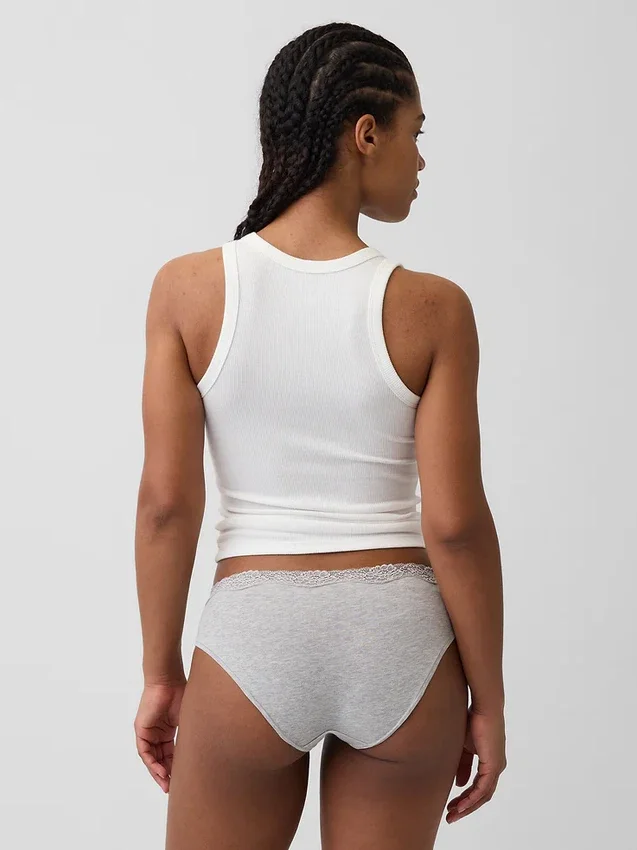 Tanga de algodón orgánico elástico con ribete de encaje