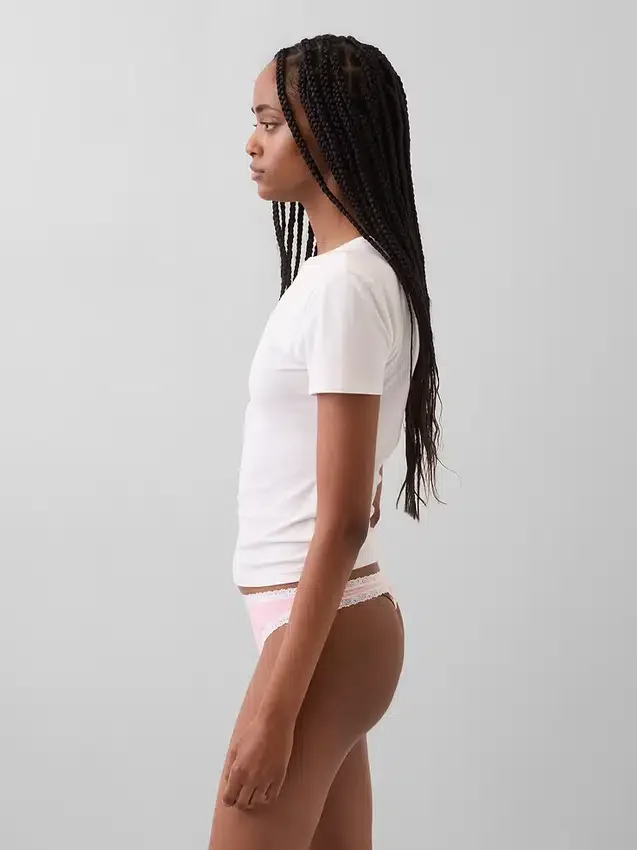 Tanga de algodón orgánico elástico con ribete de encaje