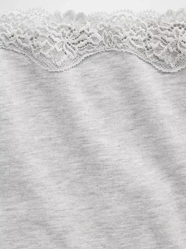 Tanga de algodón orgánico elástico con ribete de encaje