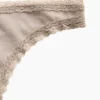 Tanga de algodón orgánico elástico con ribete de encaje