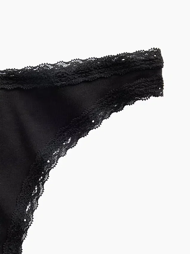 Tanga de algodón orgánico elástico con ribete de encaje