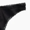 Tanga de algodón orgánico elástico con ribete de encaje