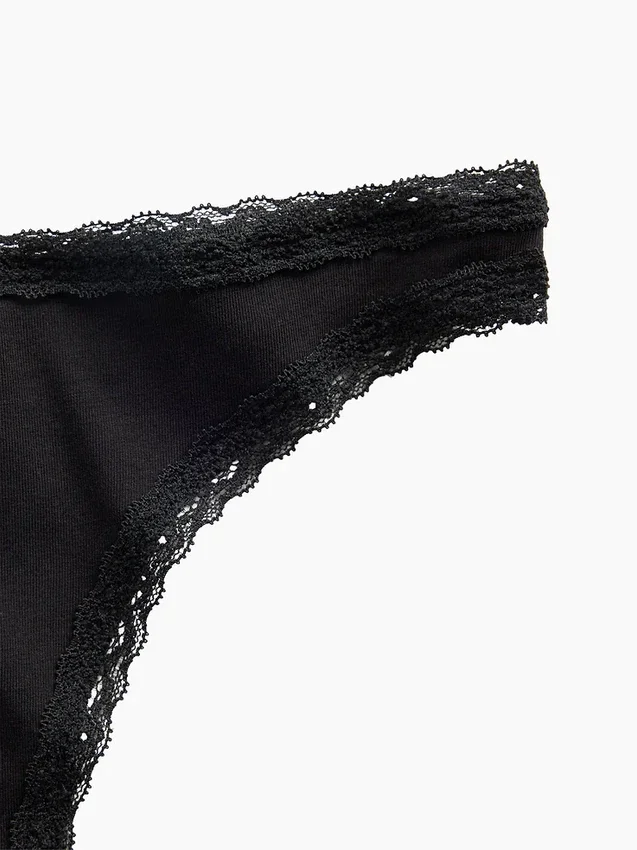Tanga de algodón orgánico elástico con ribete de encaje