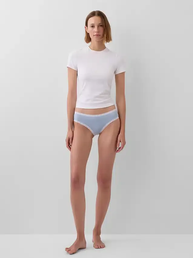 Tanga de algodón orgánico elástico con ribete de encaje