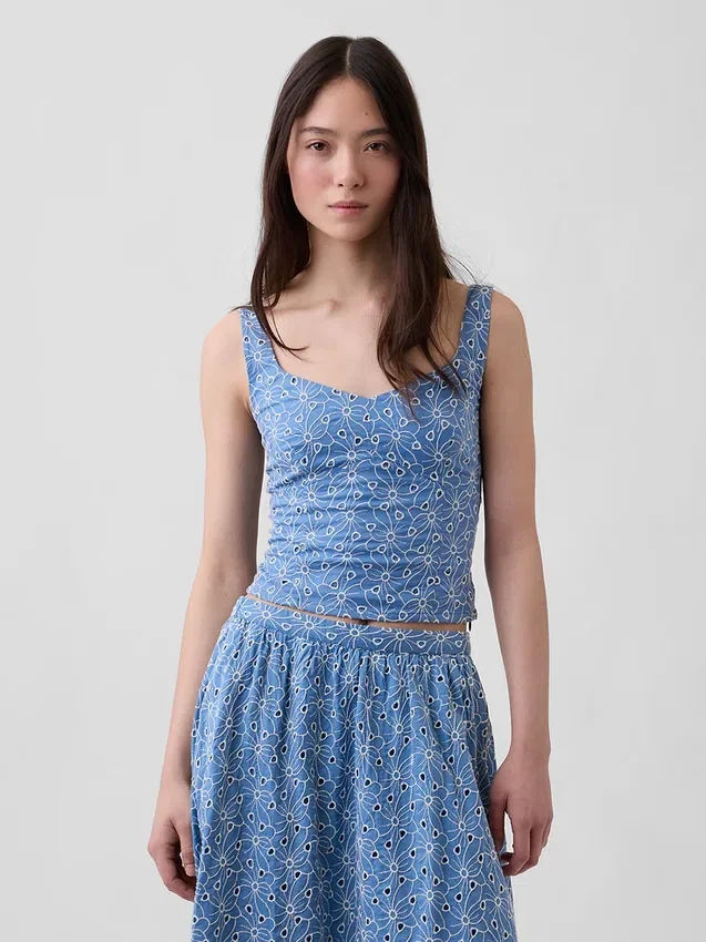 Top bustier corto con ojales