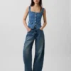 Top corsé con bolsillos de mezclilla