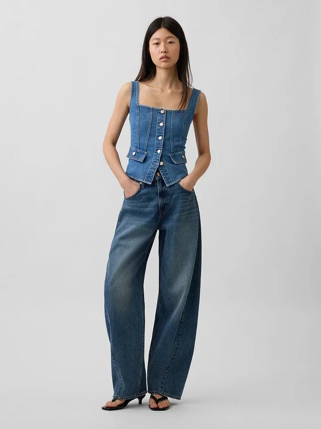 Top corsé con bolsillos de mezclilla