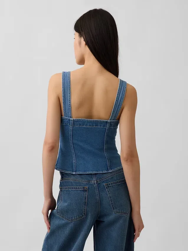 Top corsé con bolsillos de mezclilla