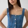 Top corsé con bolsillos de mezclilla