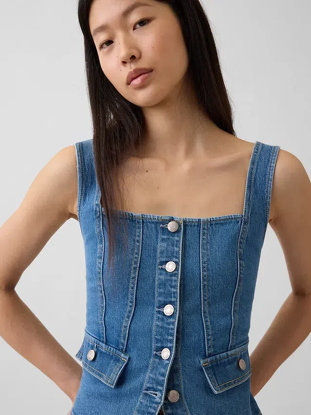 Top corsé con bolsillos de mezclilla