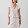 Top corto con peplum de gasa de encaje