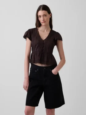 Top corto con peplum de gasa de encaje