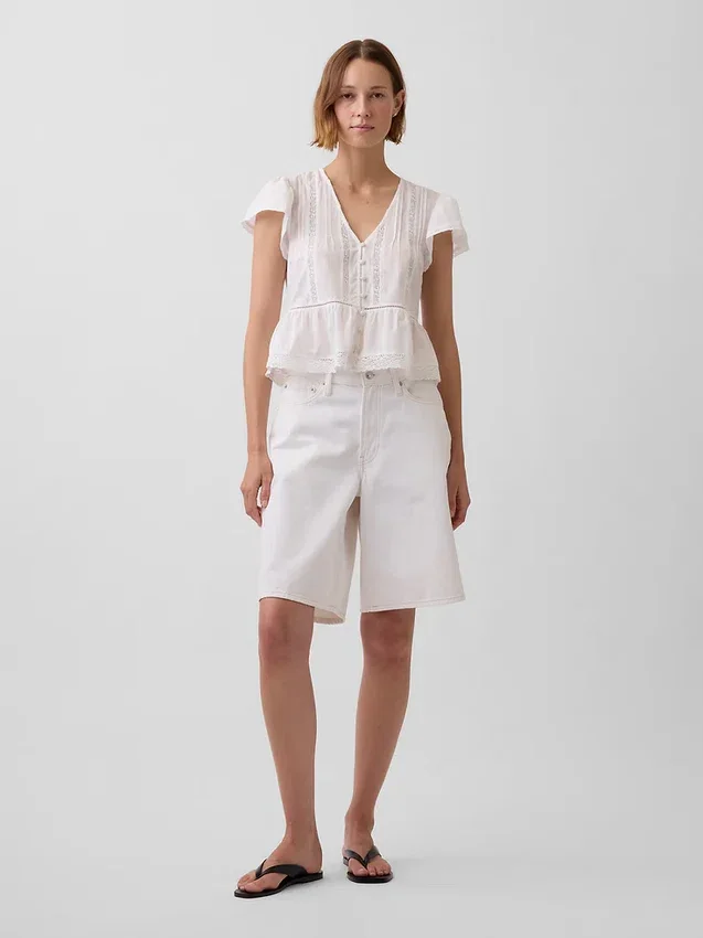 Top corto con peplum de gasa de encaje