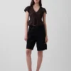Top corto con peplum de gasa de encaje