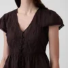 Top corto con peplum de gasa de encaje