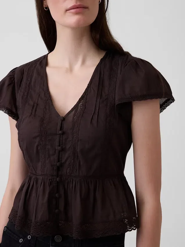 Top corto con peplum de gasa de encaje