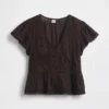 Top corto con peplum de gasa de encaje