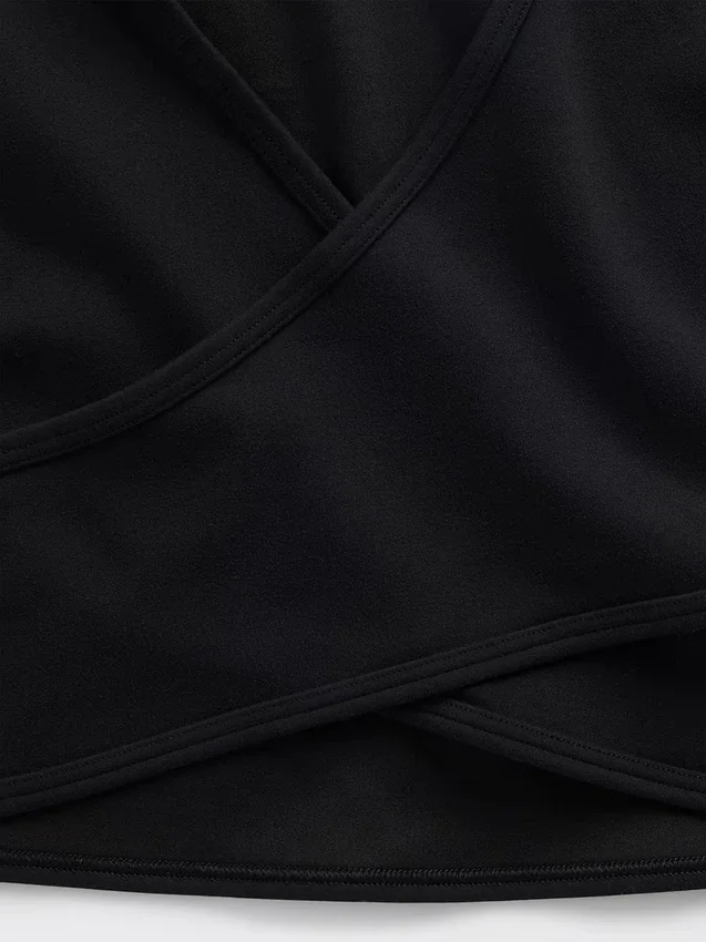 Top corto cruzado reversible GapFit Smooth