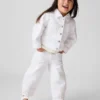Vaqueros de bebé y niño con dobladillo de ojales y diseño de herradura