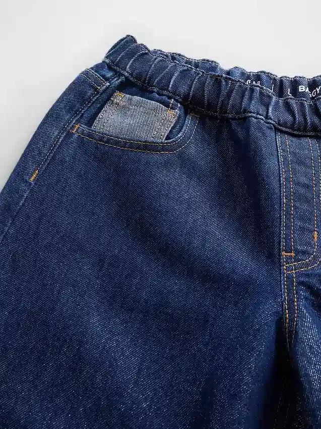 Vaqueros de mezclilla holgados de talle bajo con efecto metalizado para niños