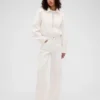 Vaqueros de talle alto con corte arqueado de GAP × Victoria Beckham