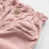 Vaqueros de terciopelo con moño para bebés y niños pequeños