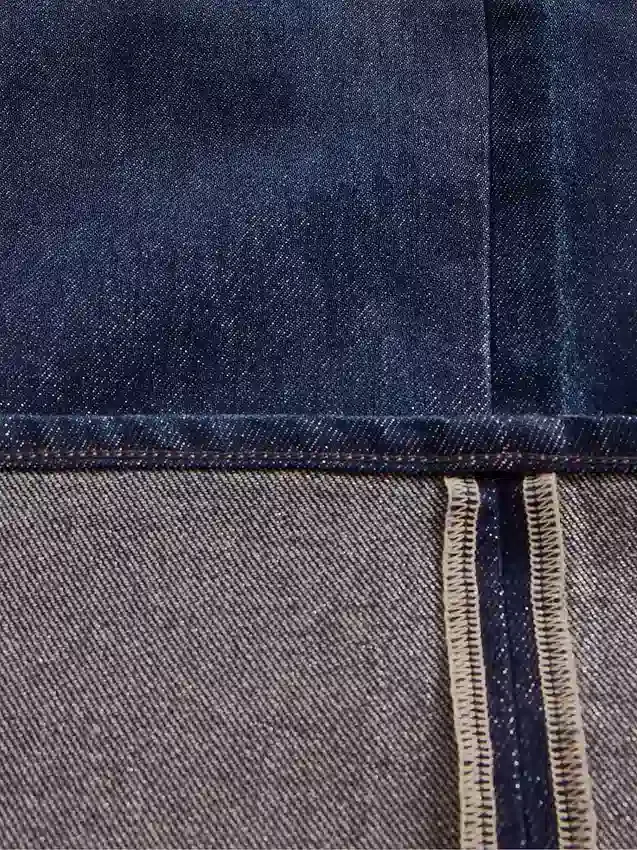 Vaqueros holgados de talle medio con dobladillo metalizado
